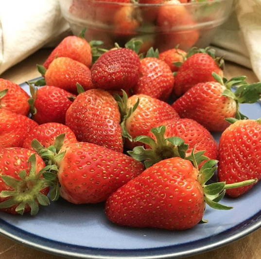Organic Farming Facts: Fresh organic strawberries harvested from our front yard. We grow our own since we can't find local organic strawberries. Interestingly, a 2010 study found that,